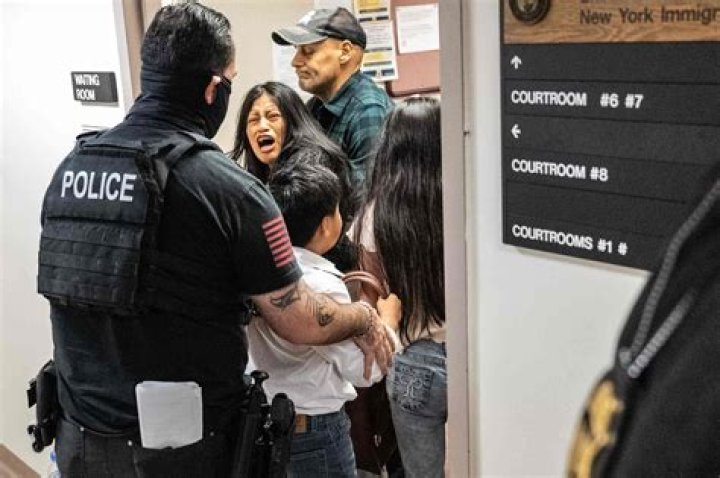 Mom dragged from court for lunging at sons' accused killer